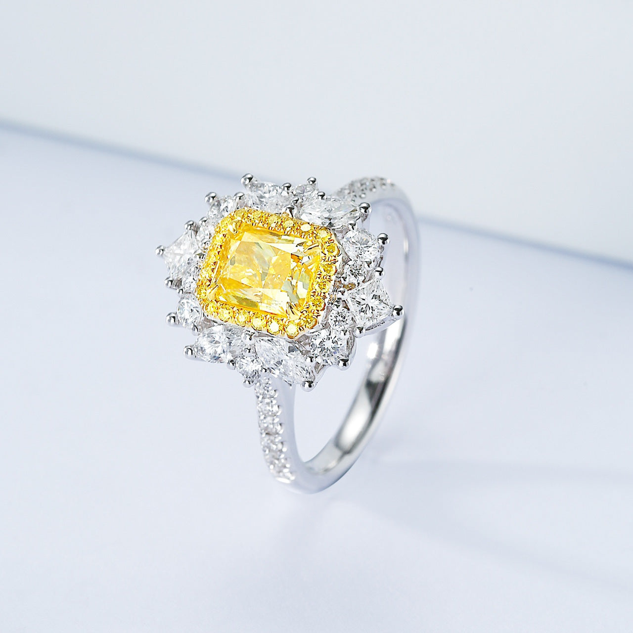 Cushion Cut Yellow Diamond Halo Engagement Ring with Pavé Setting in 18K White Gold -Side Angle