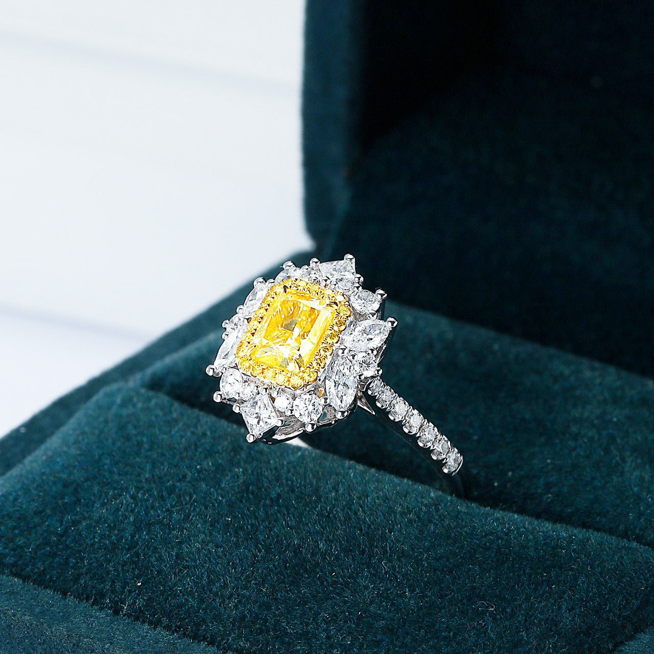 Cushion Cut Yellow Diamond Halo Engagement Ring with Pavé Setting in 18K White Gold -Perspective Close-up