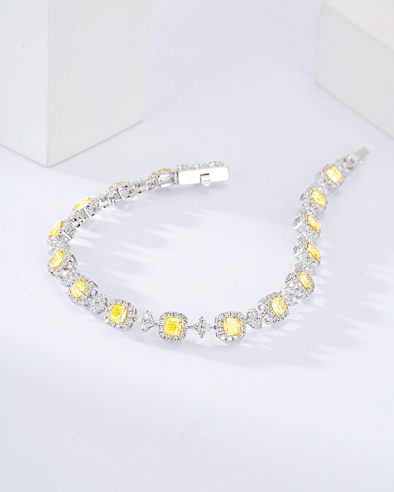 Cushion Cut Yellow Diamond Station Bracelet in 18K White Gold -Side Angle