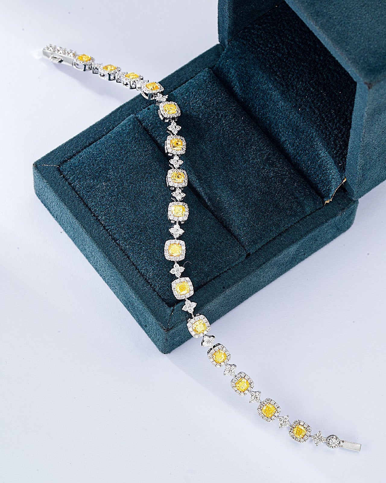 Cushion Cut Yellow Diamond Station Bracelet in 18K White Gold -Perspective Close-up