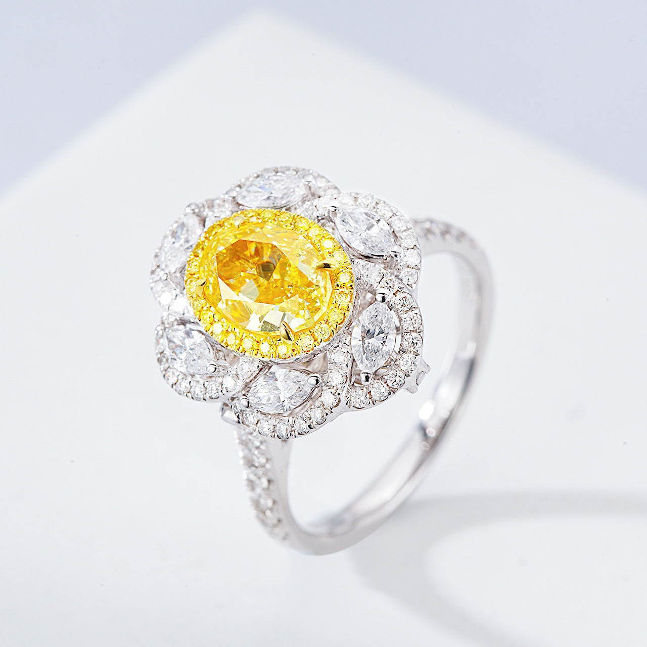 Oval Cut Yellow Diamond Halo Engagement Ring with with Marquise Accents -Side Angle