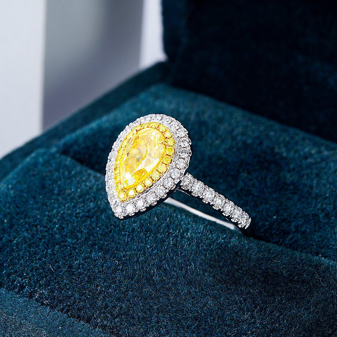 Pear Shaped Yellow Diamond Engagement Ring with Pavé Halo Setting in White Gold -In-Box Display