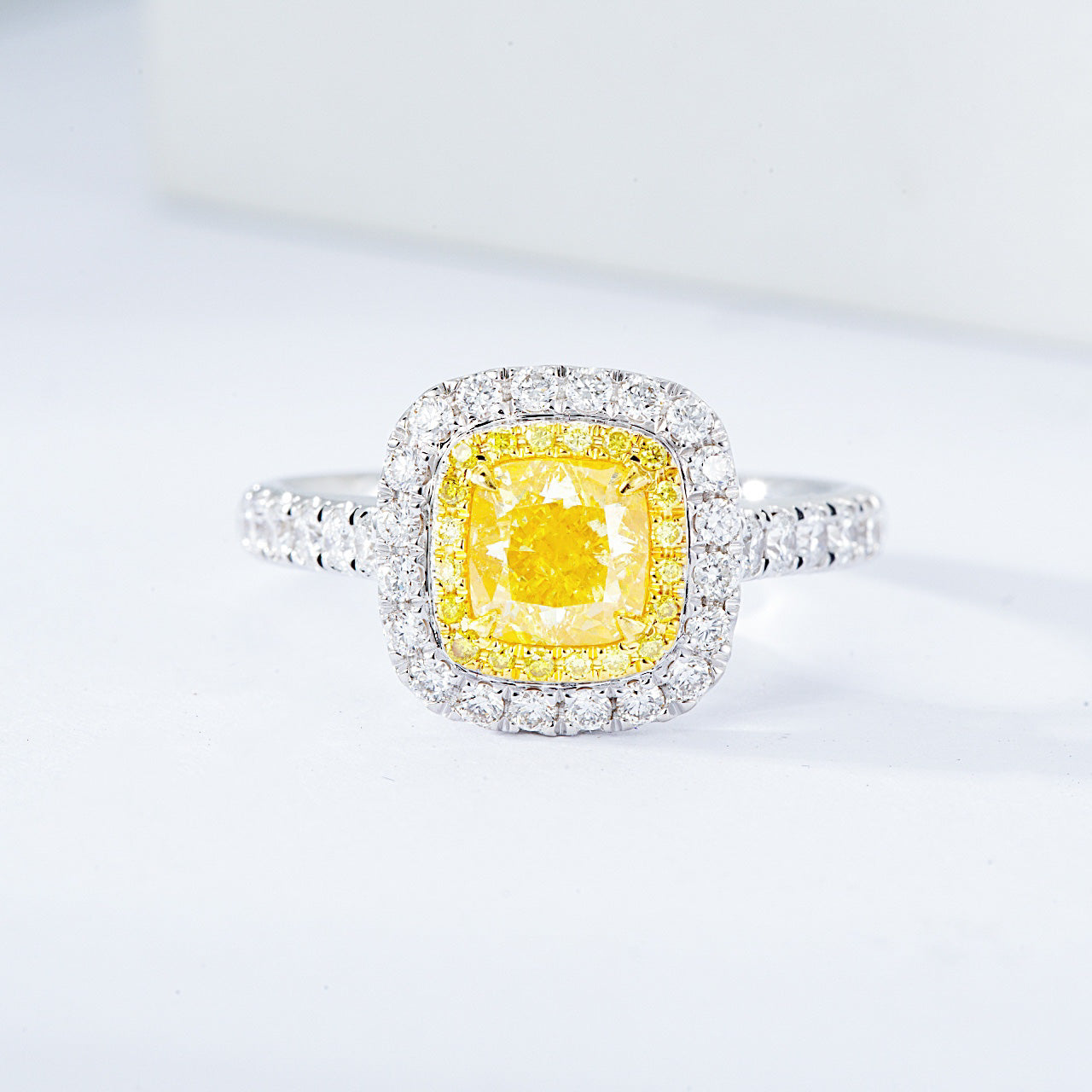 Cushion Cut Yellow Diamond Engagement Ring with Pavé Halo Setting in 18K White Gold -Front View