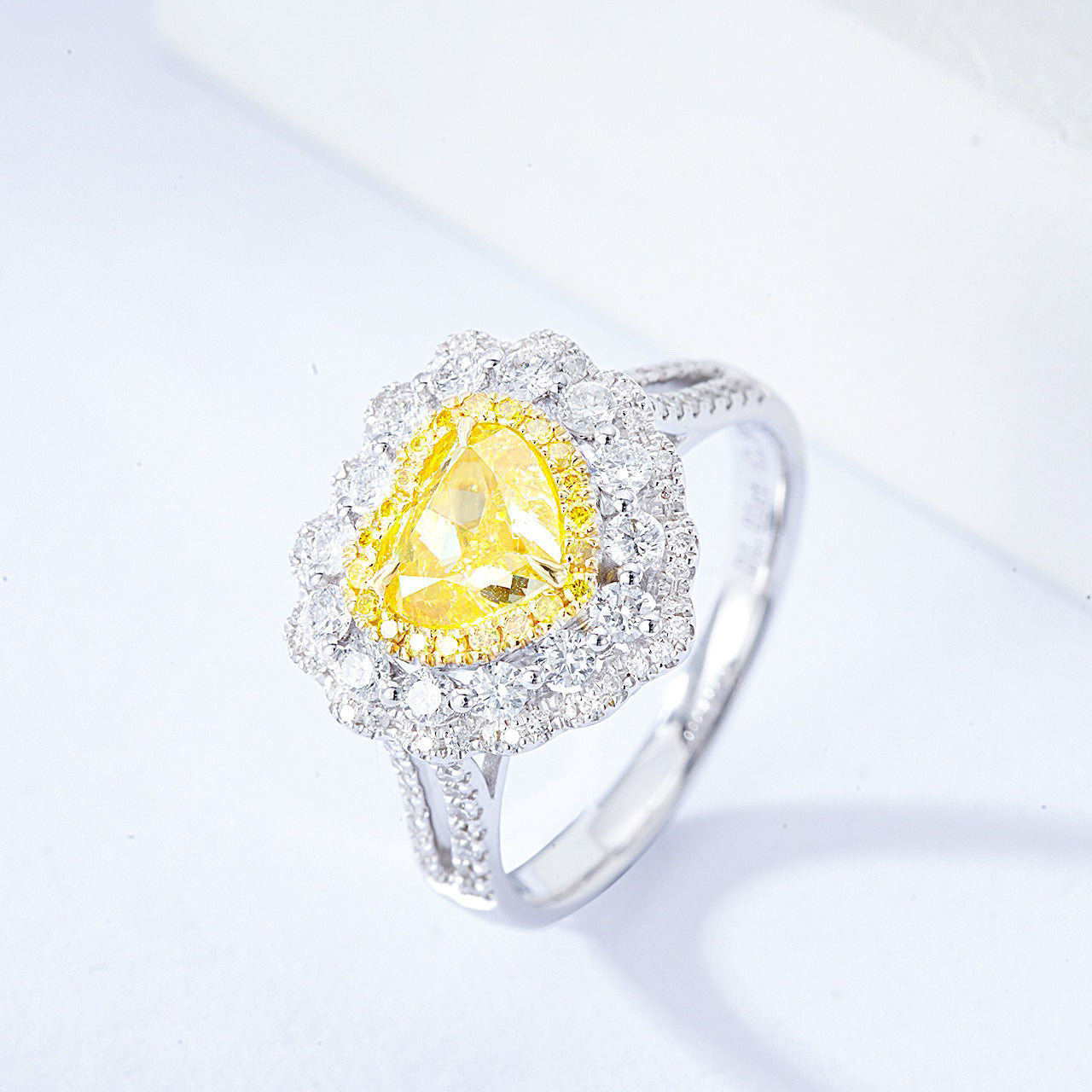 Heart Shaped Yellow Diamond Engagement Ring with Pavé Halo Setting -Side Angle