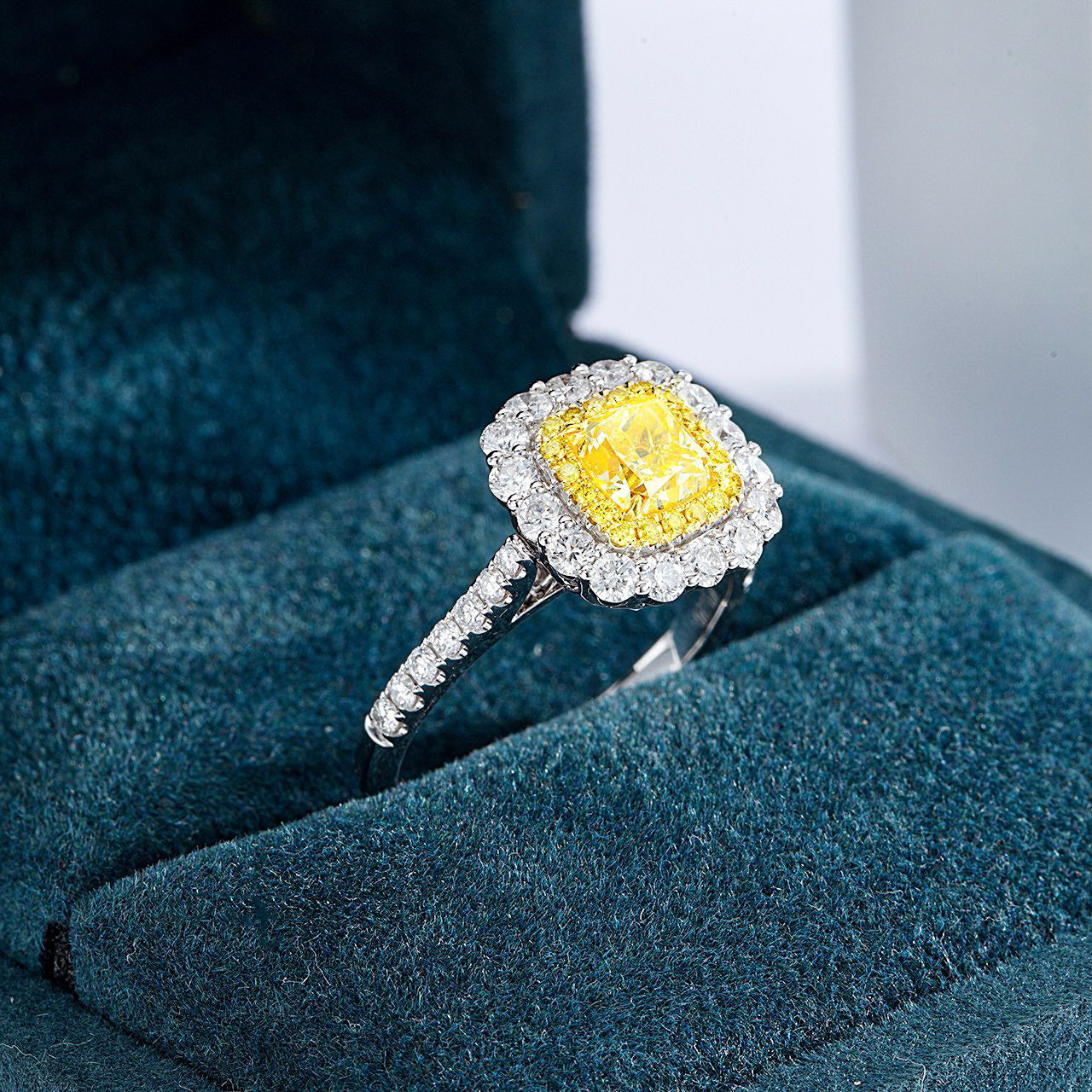 Cushion Cut Yellow Diamond Double Halo Engagement Ring with Pavé Band -Perspective Close-up