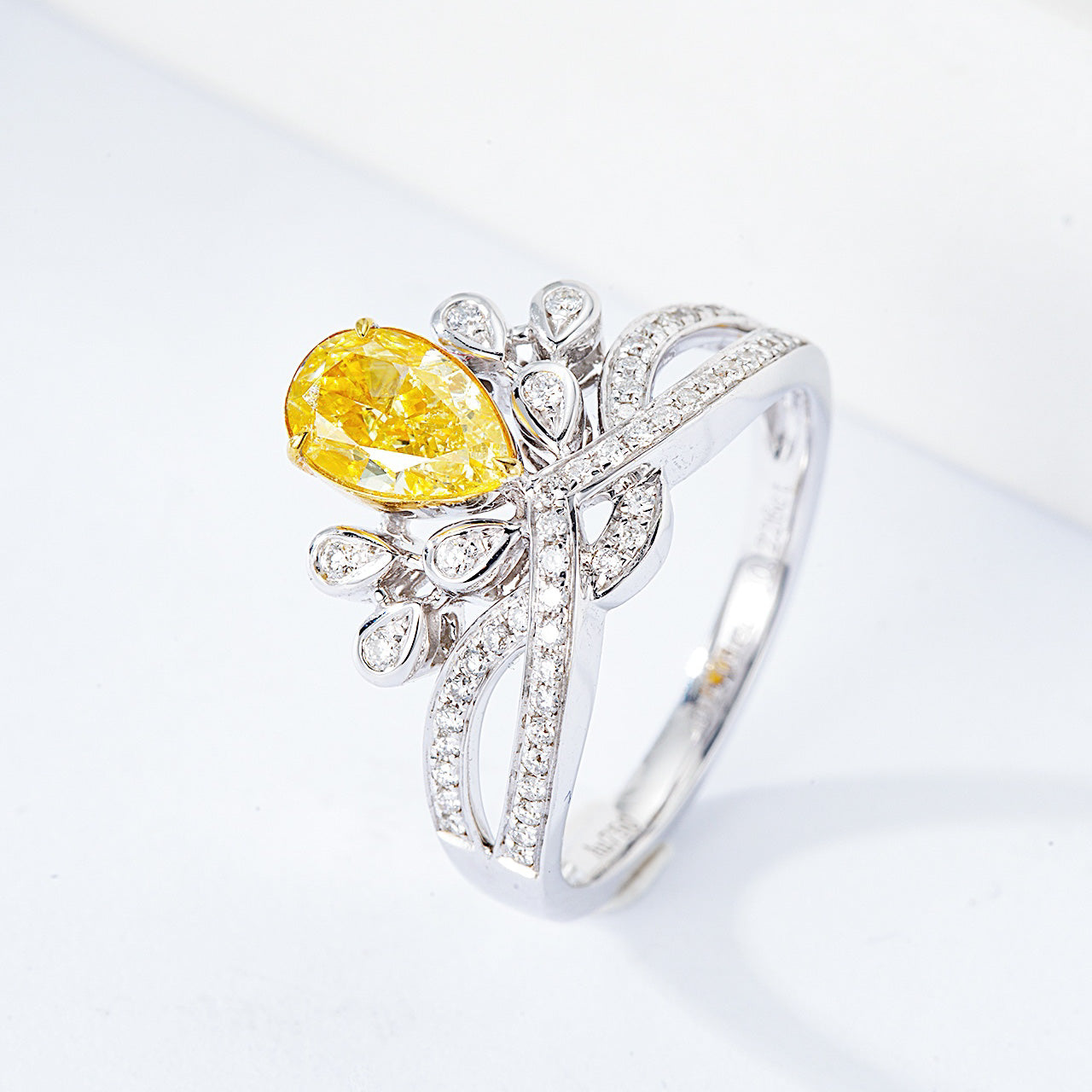 Pear Shaped Yellow Diamond Crown Ring with Channel Setting in 18K White Gold -Side Angle