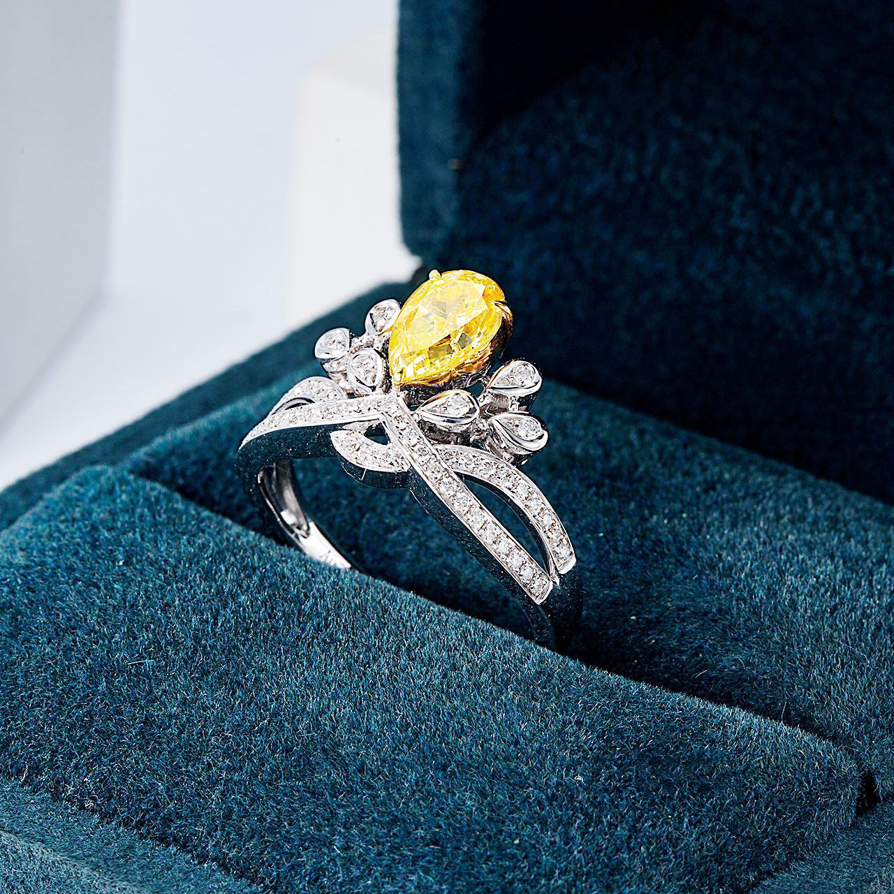 Pear Shaped Yellow Diamond Crown Ring with Channel Setting in 18K White Gold -In-Box Display