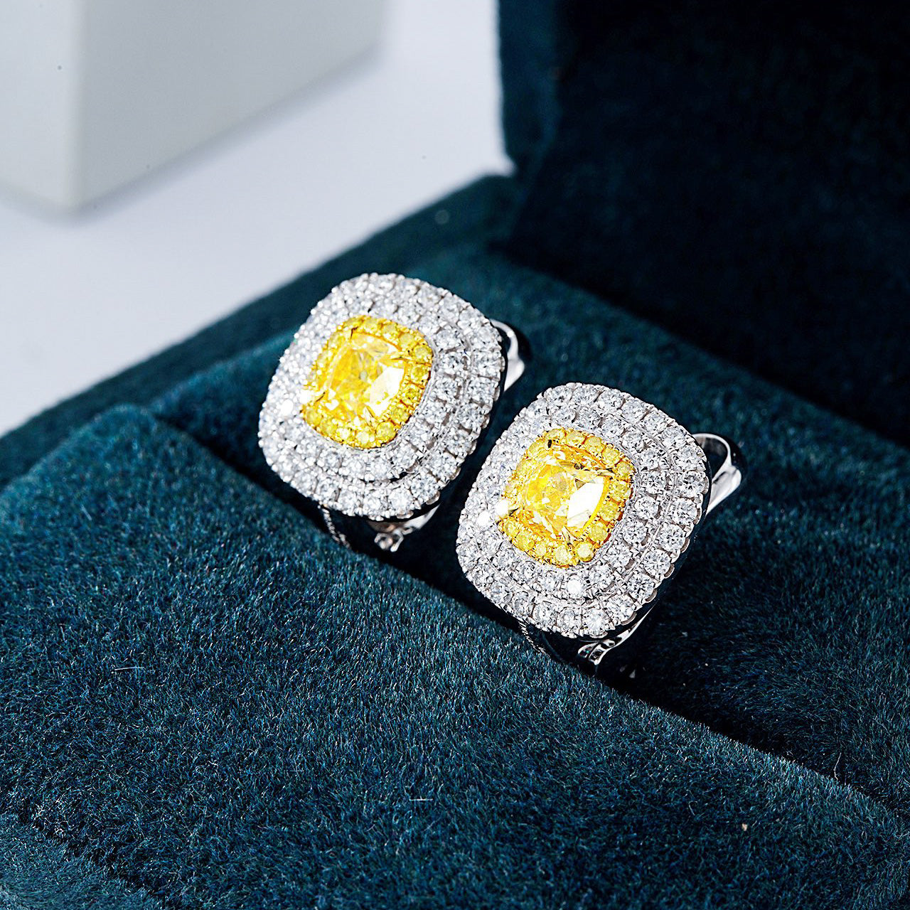 Cushion Cut Yellow Diamond Halo Earrings in White Glod -In-Box Display