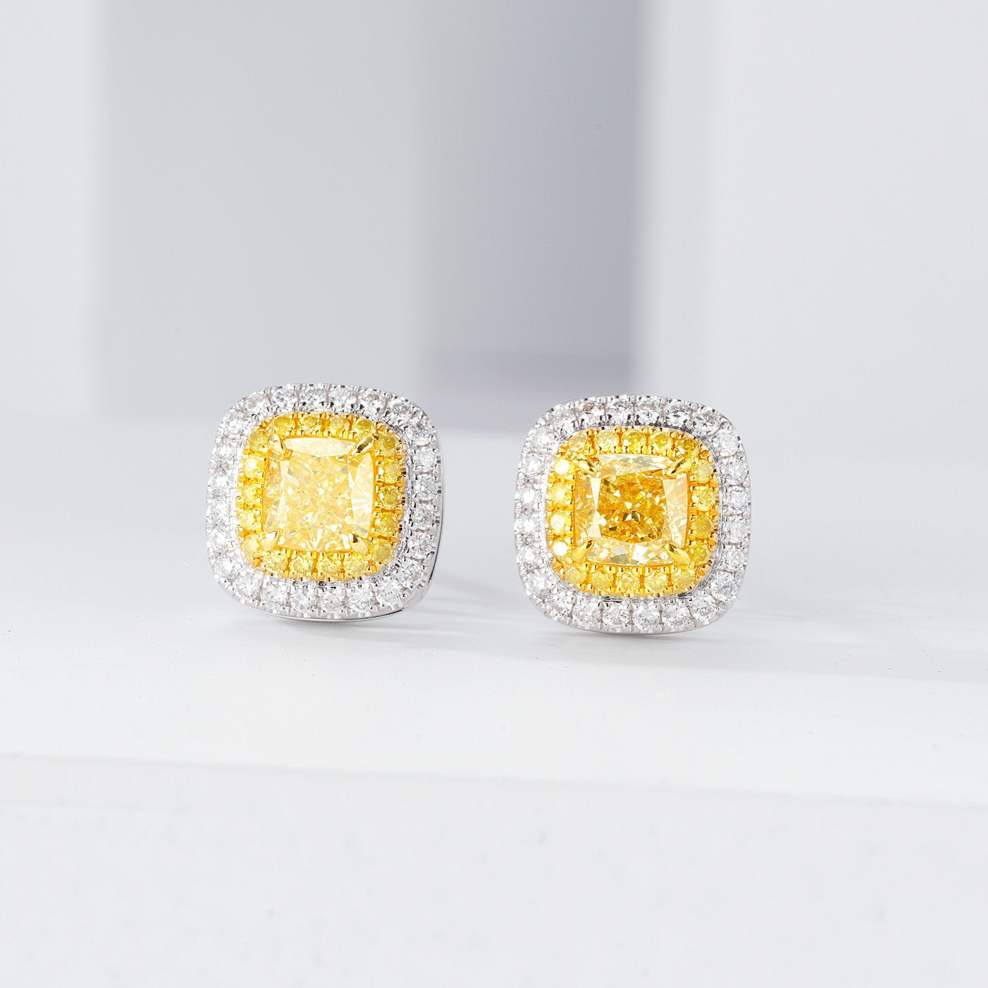 Cushion Cut Yellow Diamond Halo Stud Earrings in 18K White Gold -Front View