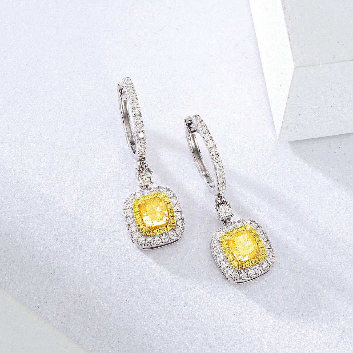 Cushion Cut Yellow Diamond Halo Drop Earrings in White Gold -Side Angle