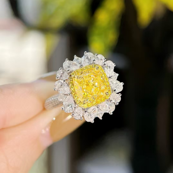 cushion cut yellowd diamond ring