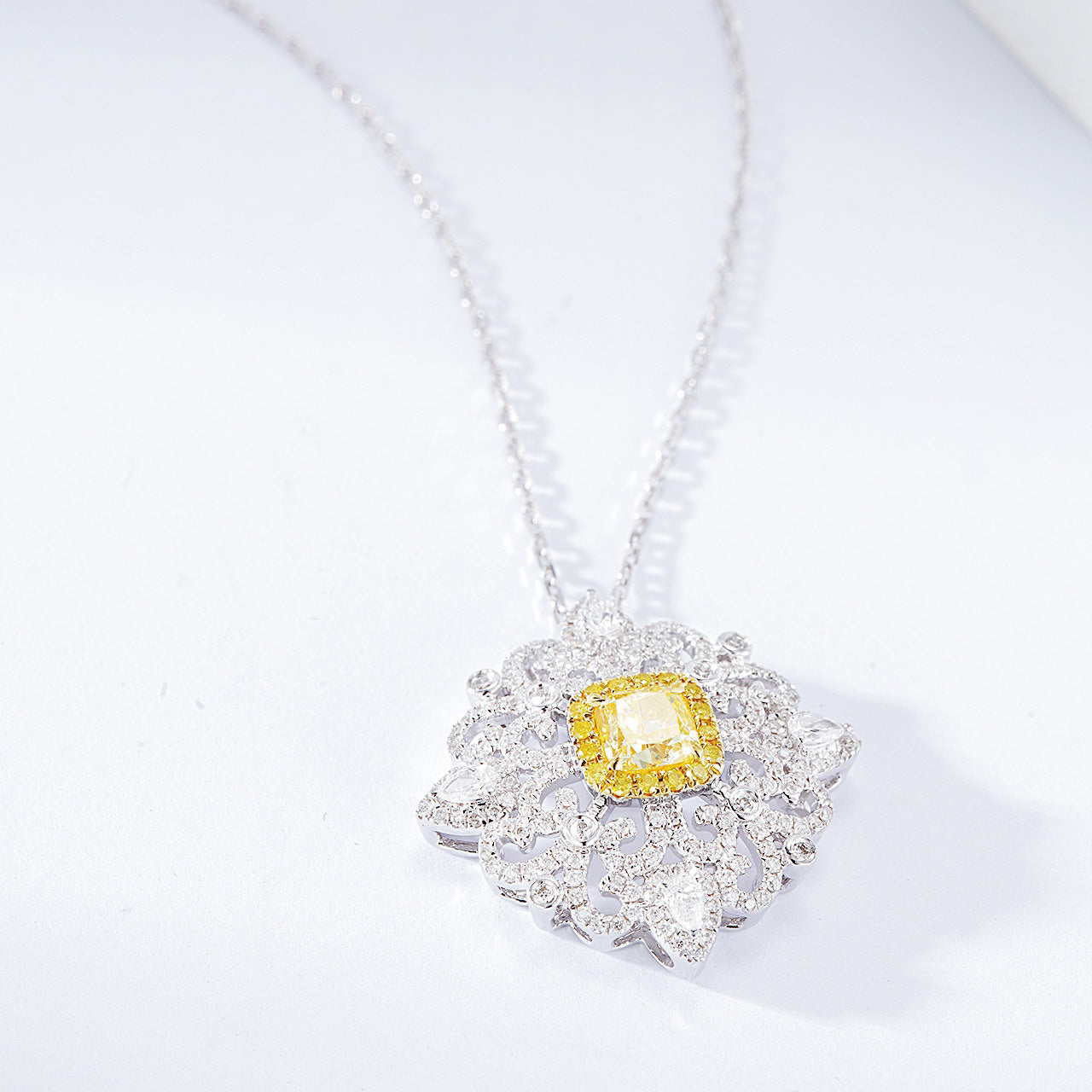 Cushion Cut Yellow Diamond Pendant with Cross Floral Diamond Setting -Side Angle