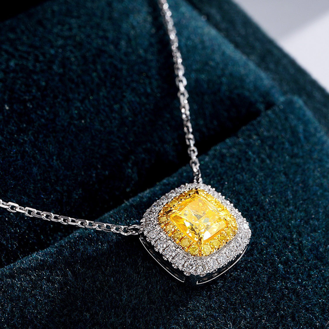 Cushion Cut Yellow Diamond Halo Pendant in 18K White Gold -Perspective Close-up