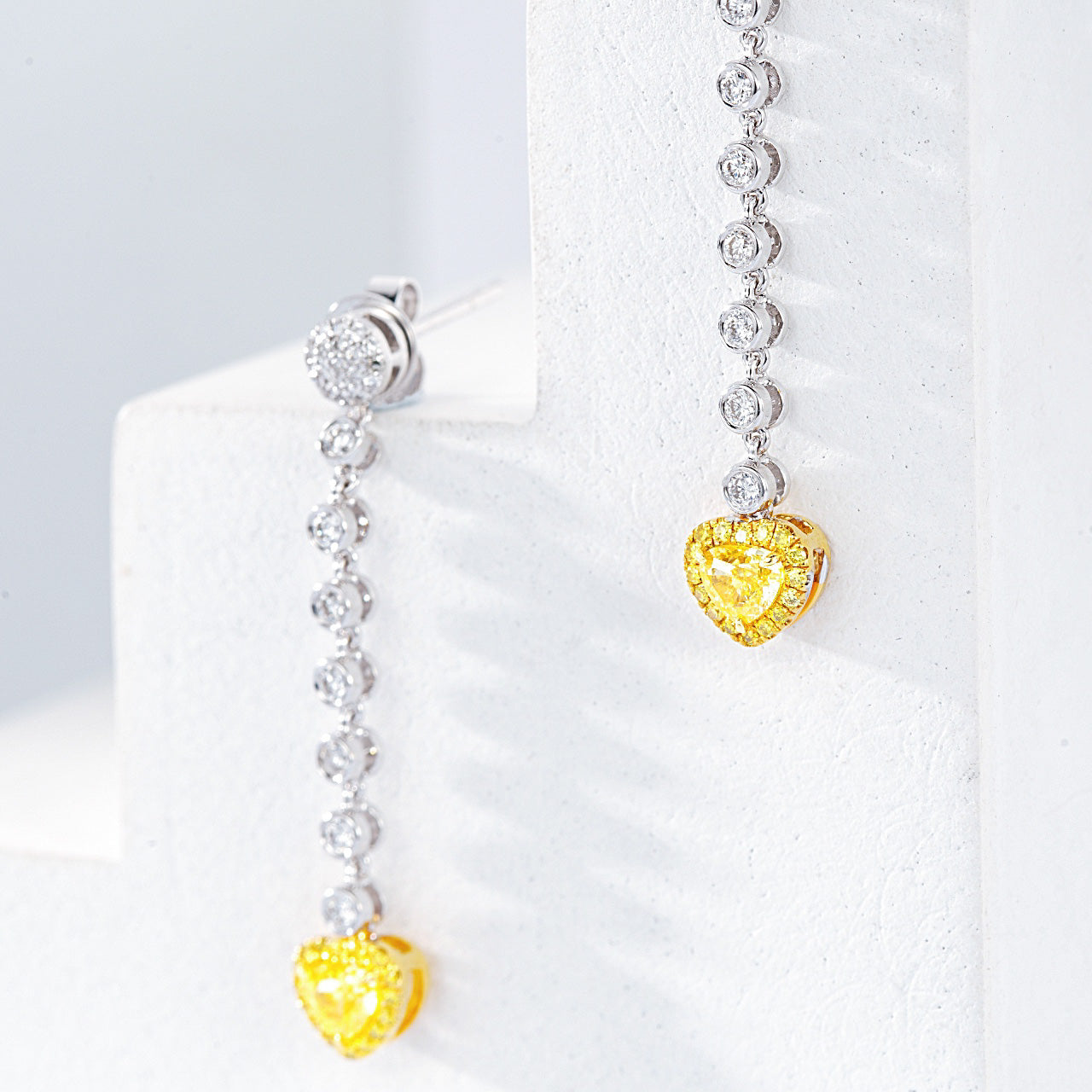 Heart Shaped Yellow Diamond Journey Earrings in White Gold -Top View