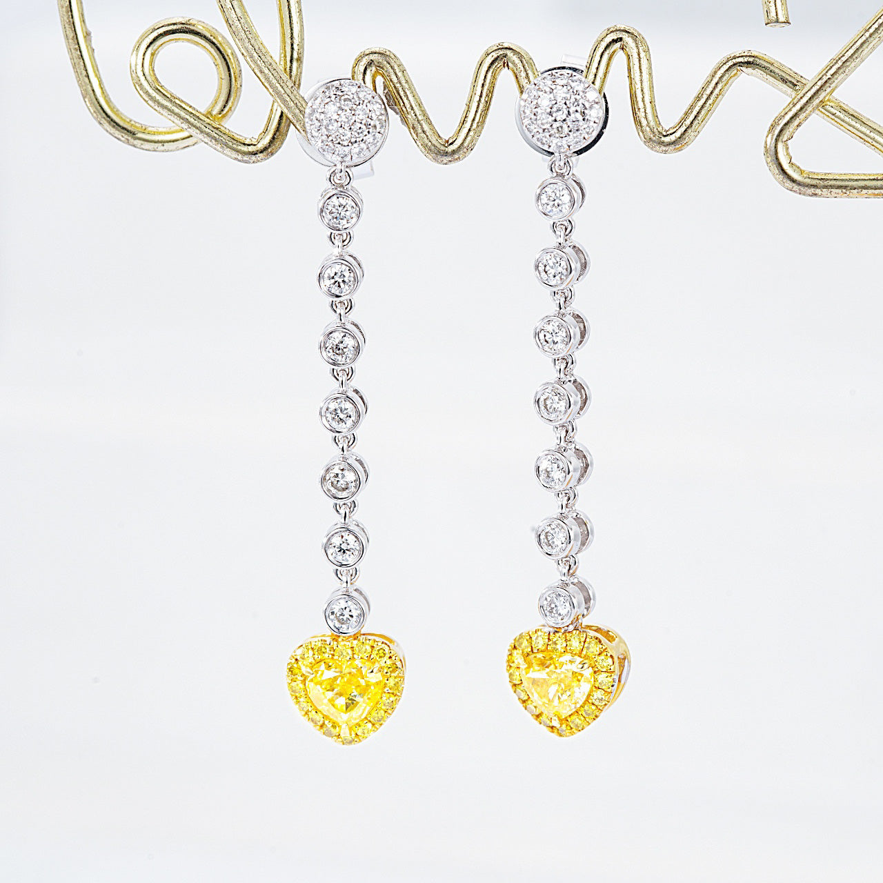 Heart Shaped Yellow Diamond Journey Earrings in White Gold -Front View