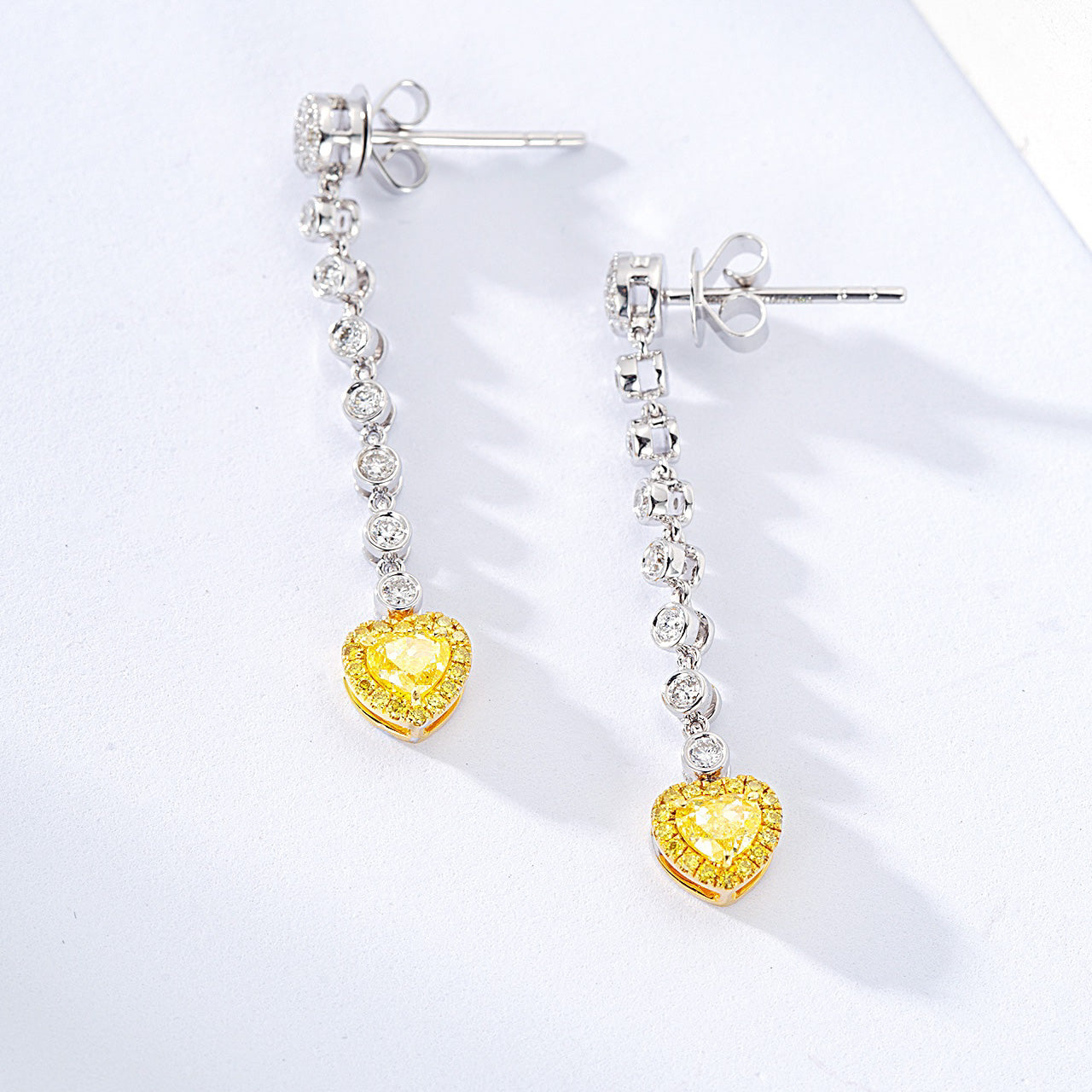 Heart Shaped Yellow Diamond Journey Earrings in White Gold -Side Angle