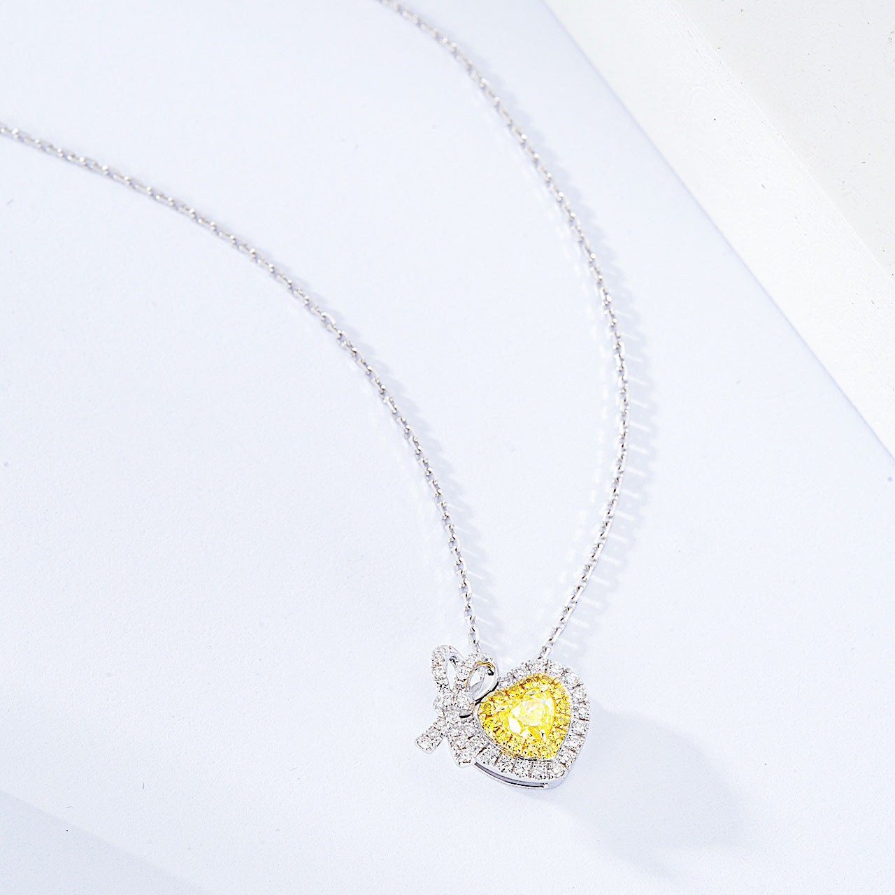 Heart Shaped Yellow Diamond Pendant in 18K White Gold -Side Angle