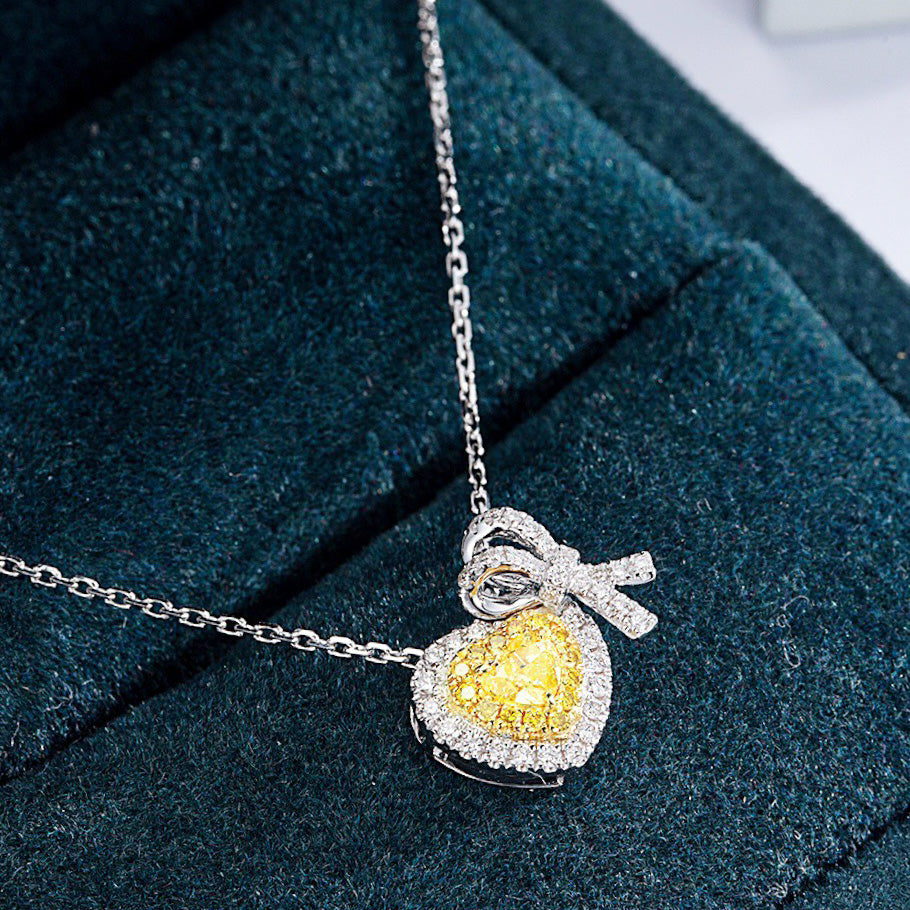 Heart Shaped Yellow Diamond Pendant in 18K White Gold -Perspective Close-up