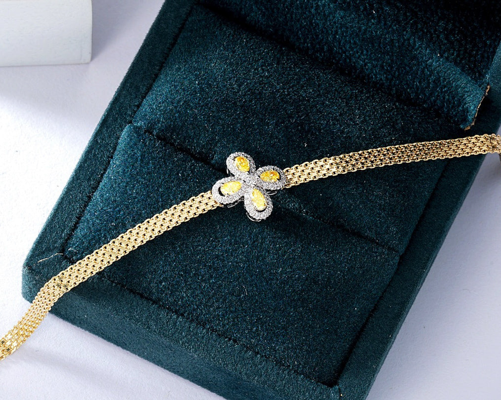 Pear Shaped Yellow Diamond Braided Bracelet in 18K Yellow Gold -Perspective Close-up