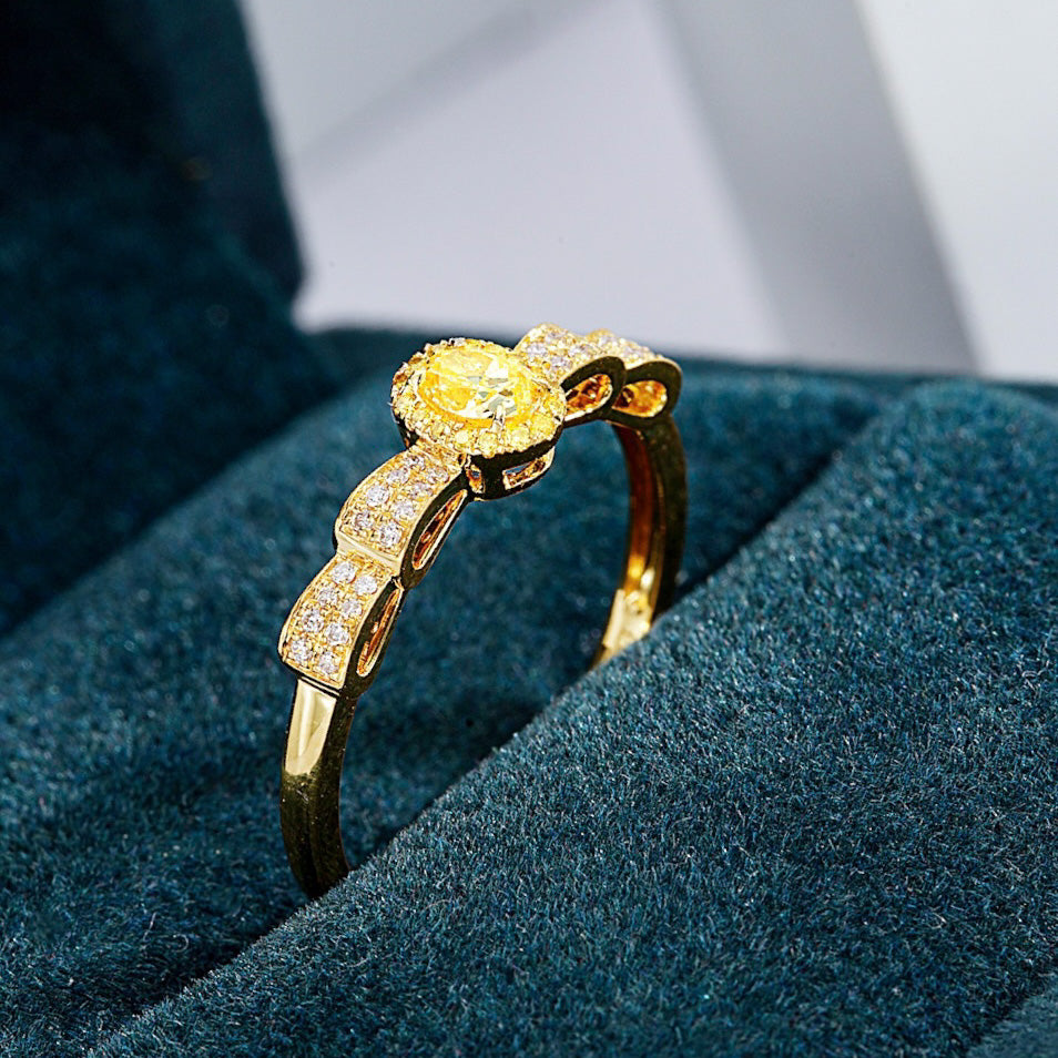 Oval Cut Yellow Diamond Vintage Engagement Ring in Yellow Gold -Perspective Close-up