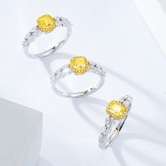 Cushion Cut Yellow Diamond Engagement Ring with Marquise Side Stone Setting