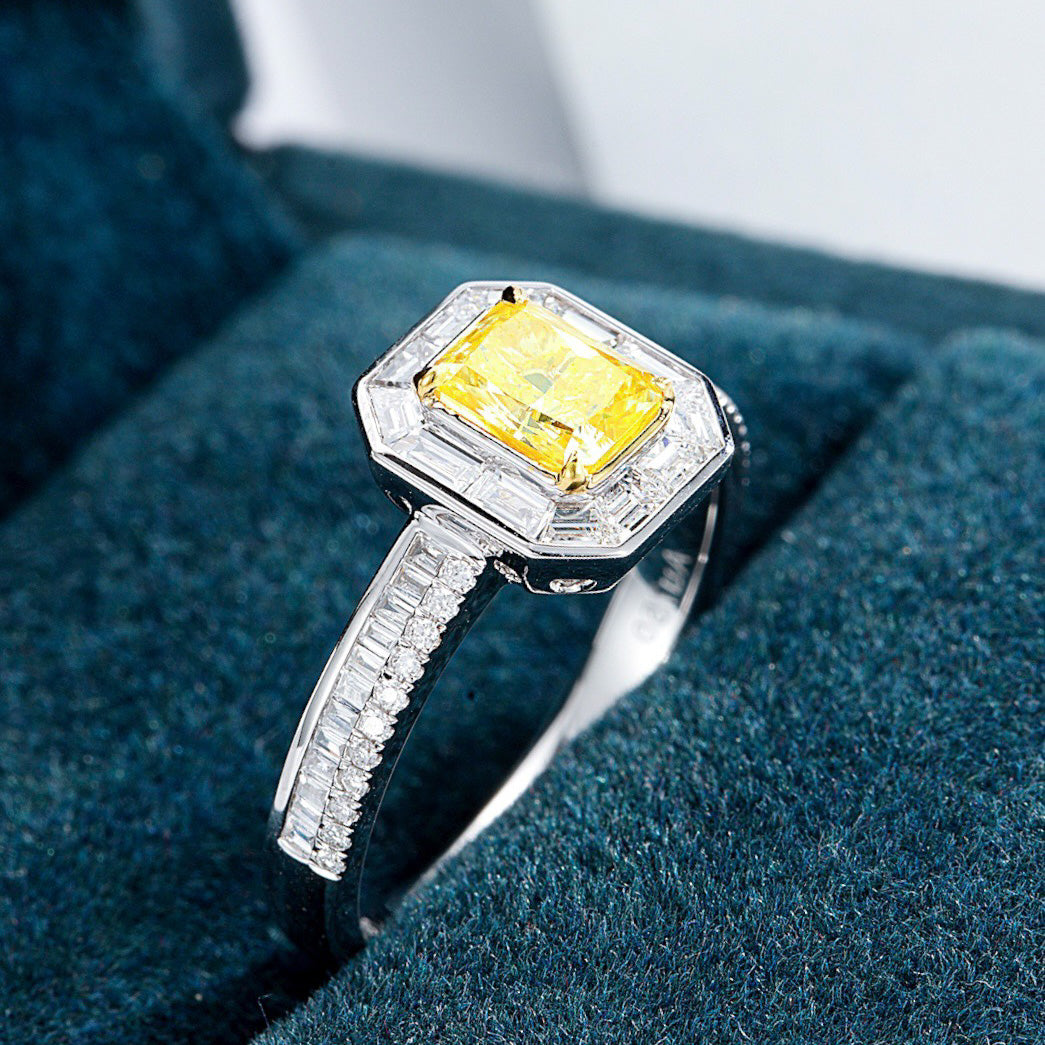 Radiant Cut Yellow Diamond Engagement Ring with Baguette Halo -Perspective Close-up