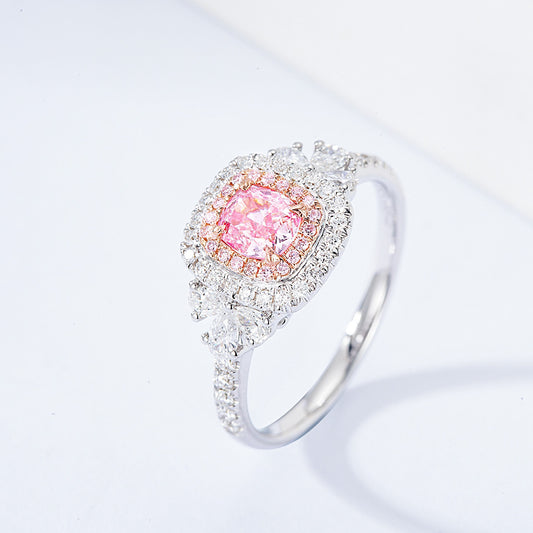 Cushion Cut Pink Diamond Engagement Ring With Pavé Halo Setting In 18K White Gold