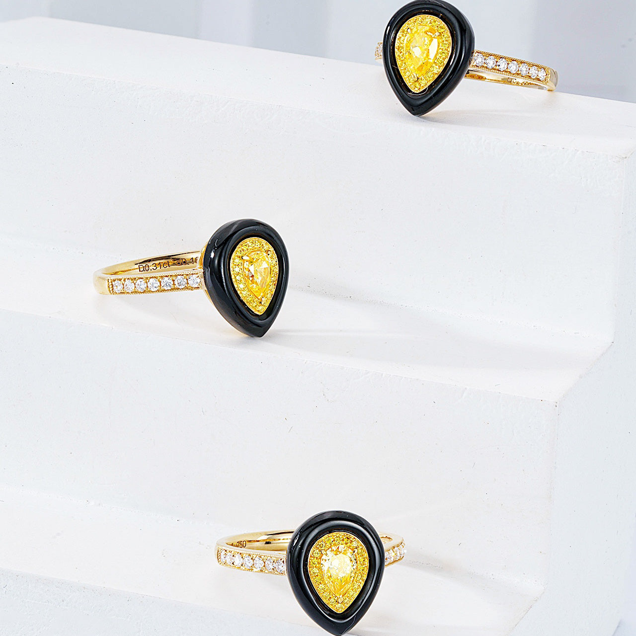 Pear Shaped Yellow Diamond Ring with Black Onyx Accent -Top View