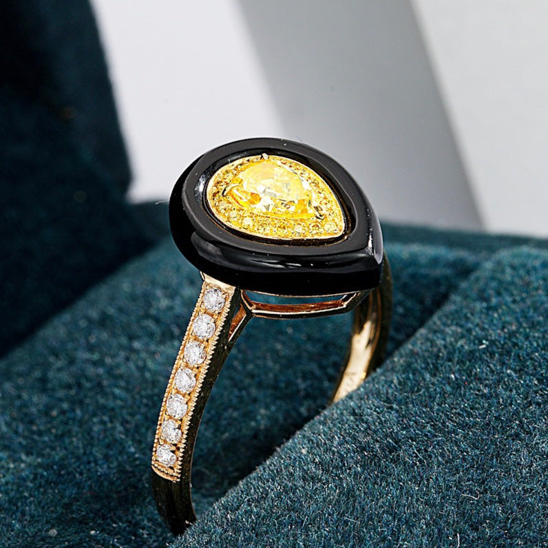 Pear Shaped Yellow Diamond Ring with Black Onyx Accent -Perspective Close-up