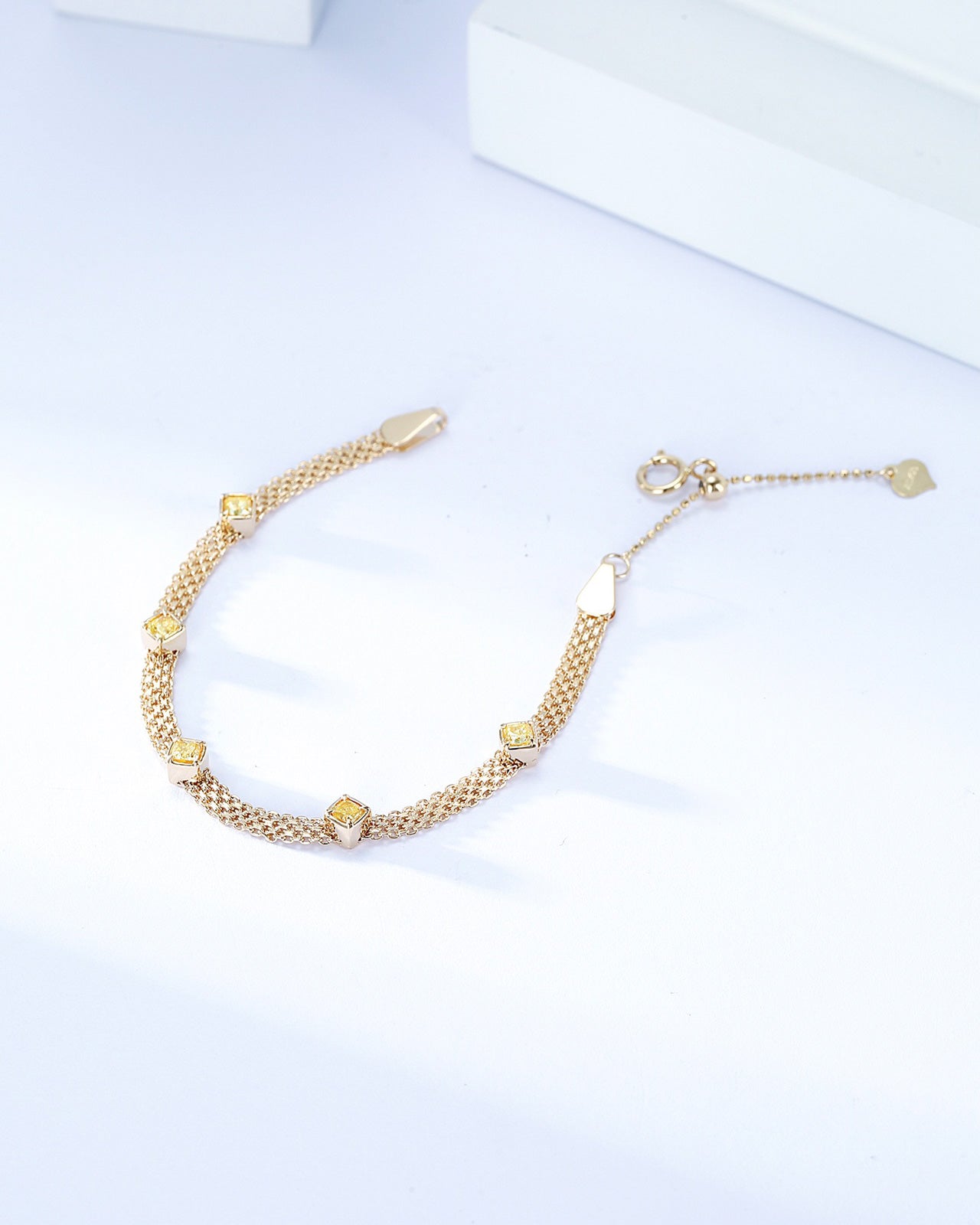 Five Cushion Cut Yellow Diamond Braided Station Bracelet in 18K Yellow Gold -Side Angle