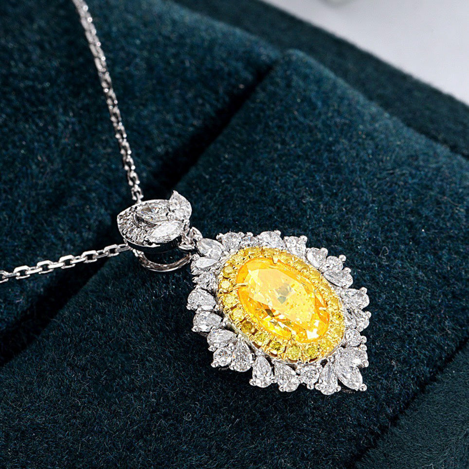 Oval Cut Yellow Diamond Designer Pendant with Pear Cut Diamond Halo -Perspective Close-up