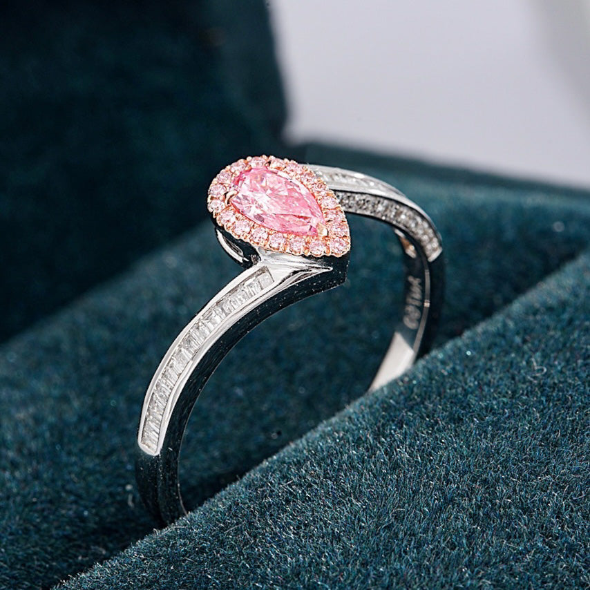 Pear Shaped Pink Diamond Ring with Baguette Cut Diamond Band -Perspective Close-up