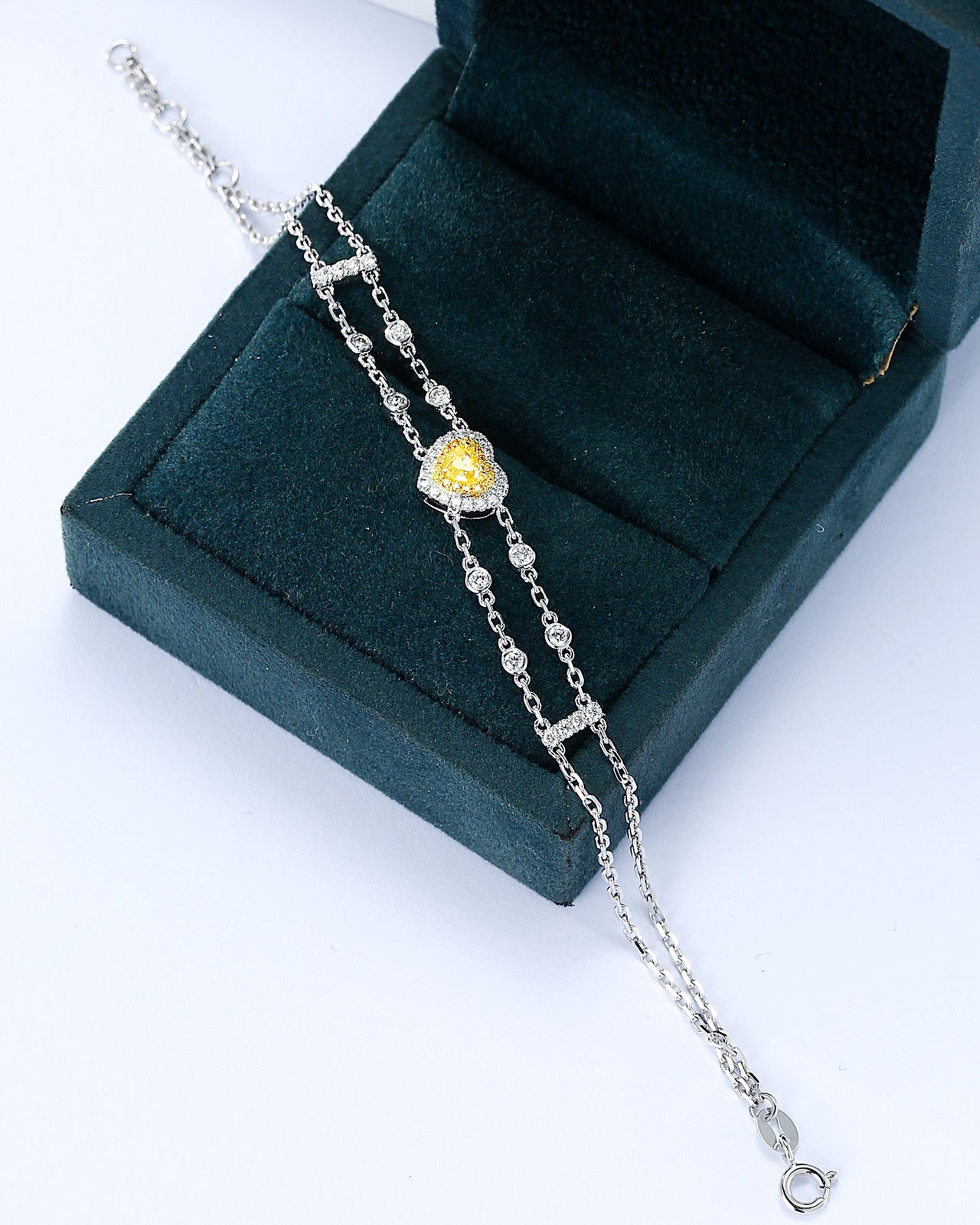 Heart Shaped Yellow Diamond Chain Bracelet in 18K Gold -Perspective Close-up