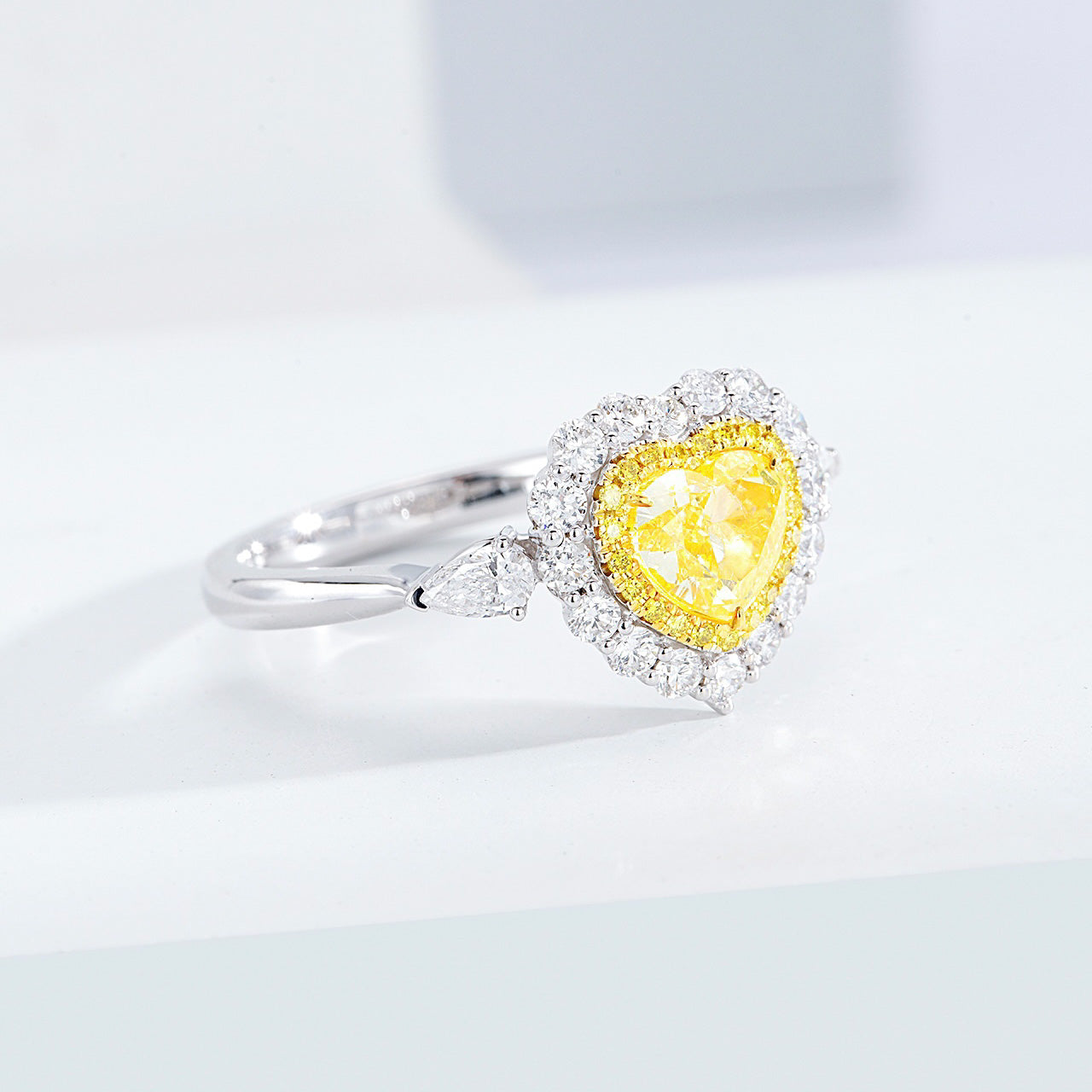 Heart Shaped Yellow Diamond Halo Engagement Ring with Three Stone Setting -Top View