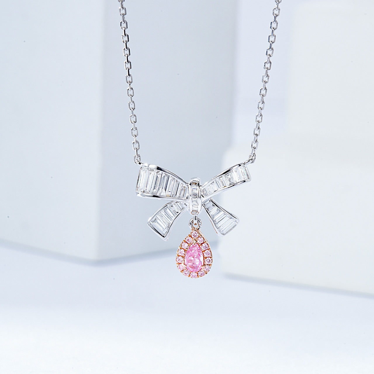 Pear Shaped Pink Diamond Pendant with Butterfly Bow Design in 18K White Gold -Front View