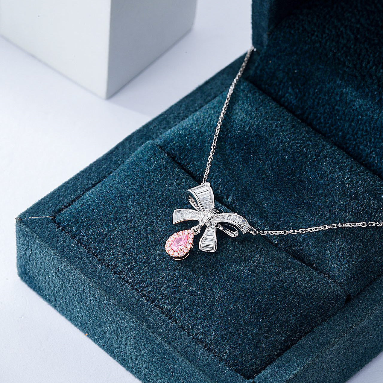 Pear Shaped Pink Diamond Pendant with Butterfly Bow Design in 18K White Gold -In-Box Display