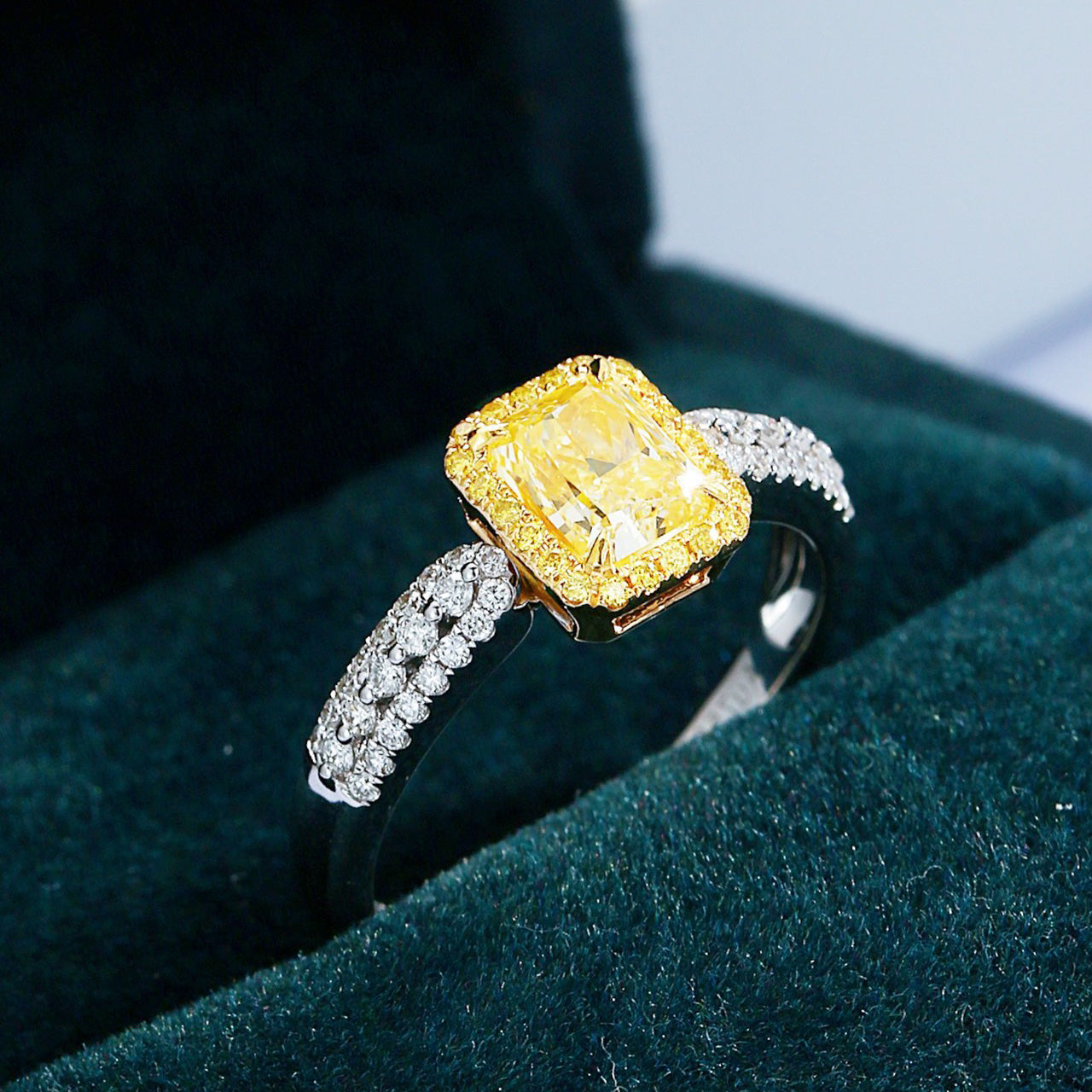 Radiant Cut Yellow Diamond Halo Engagement Ring with Pavé Setting -Perspective Close-up