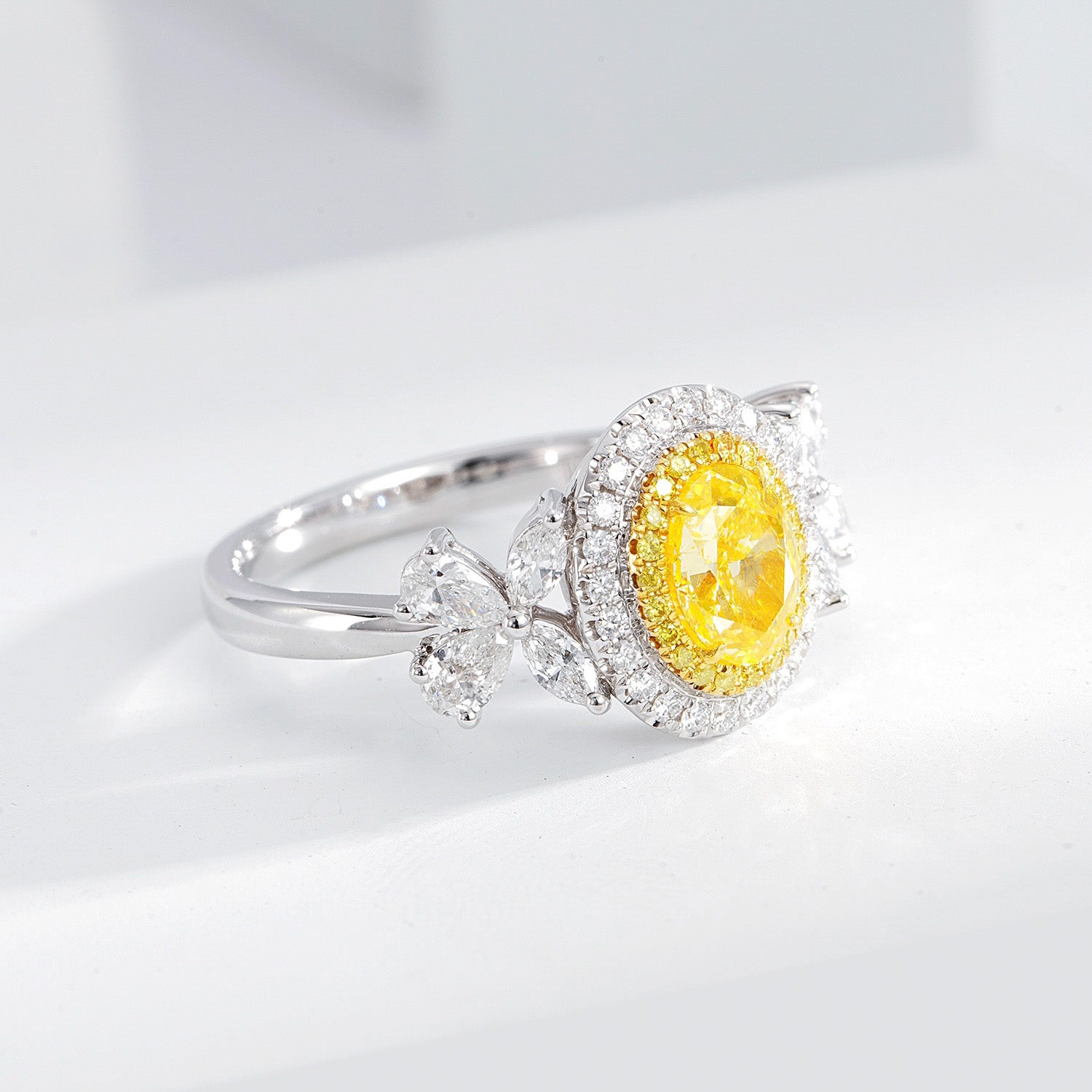 Oval Cut Yellow Diamond Halo Engagement Ring with Pear & Marquise Shaped Side Stones in 18K White Gold -Top View