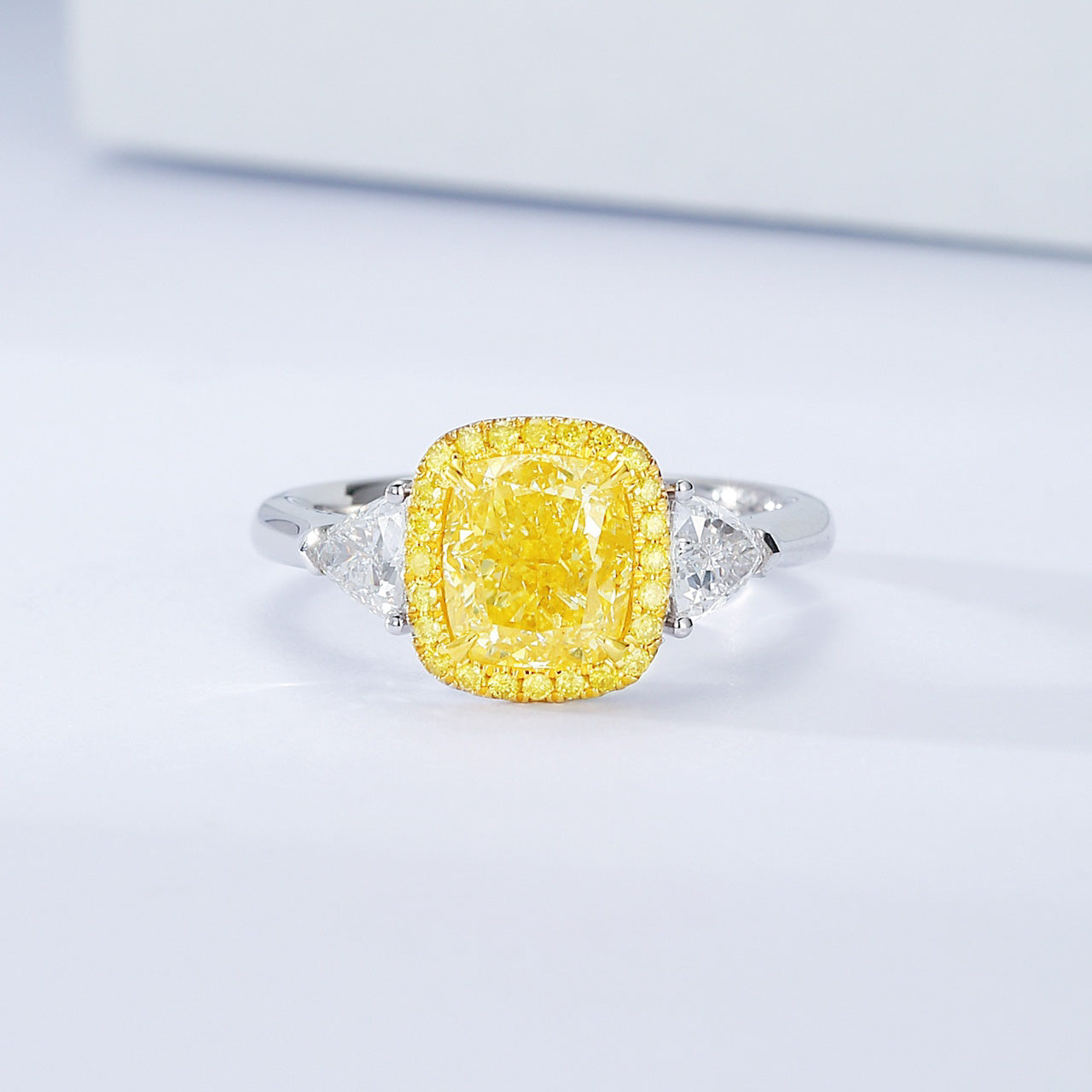 Cushion Cut Yellow Diamond Halo Engagement Ring with Three Stone Setting -Front View