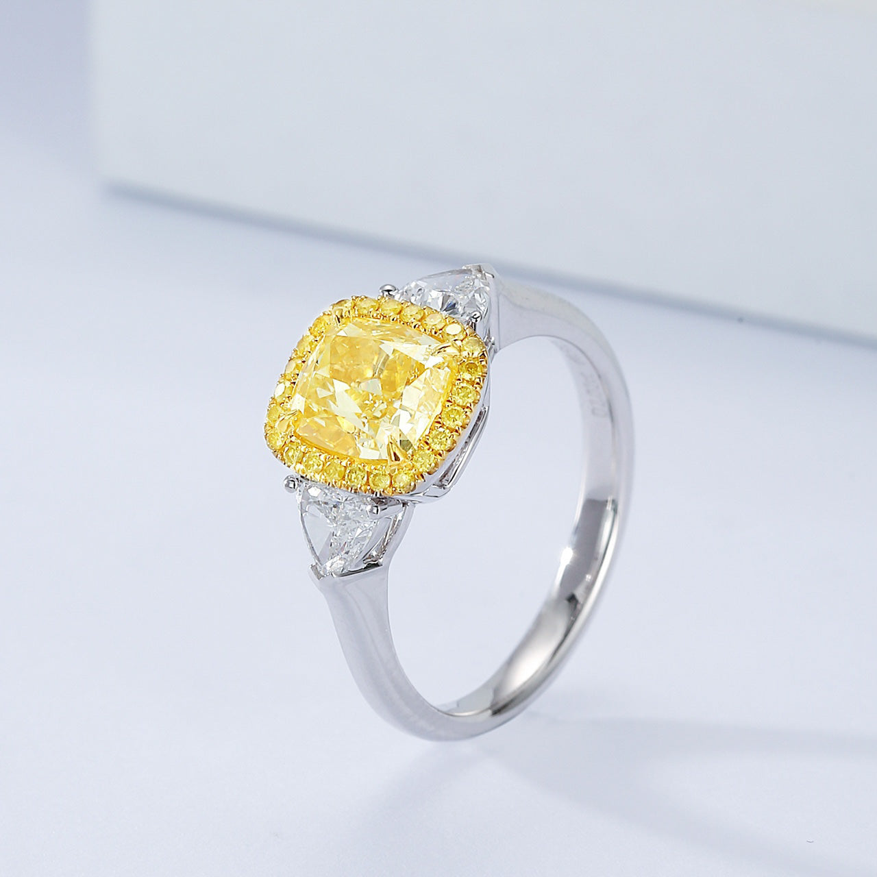 Cushion Cut Yellow Diamond Halo Engagement Ring with Three Stone Setting -Side Angle