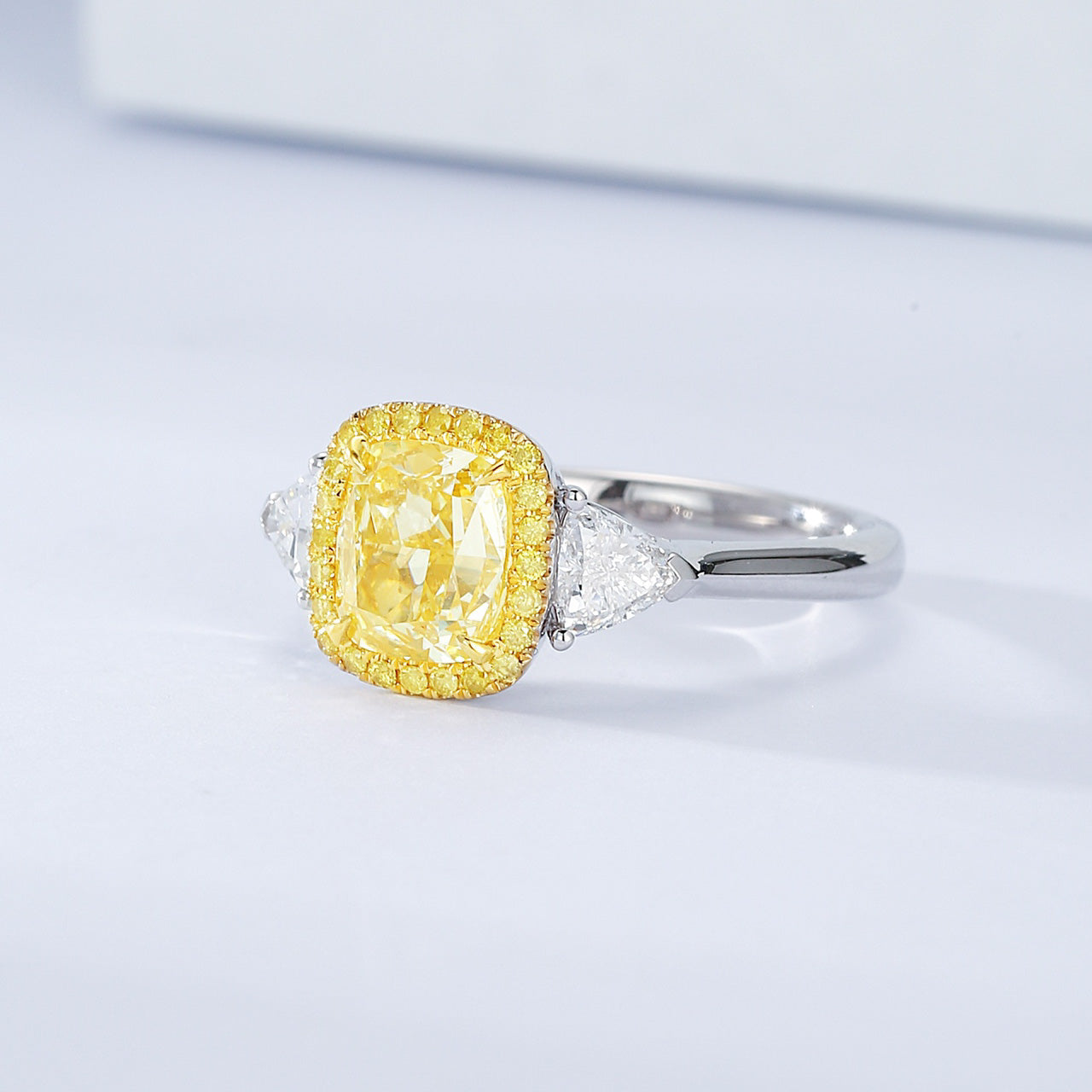 Cushion Cut Yellow Diamond Halo Engagement Ring with Three Stone Setting -Top View