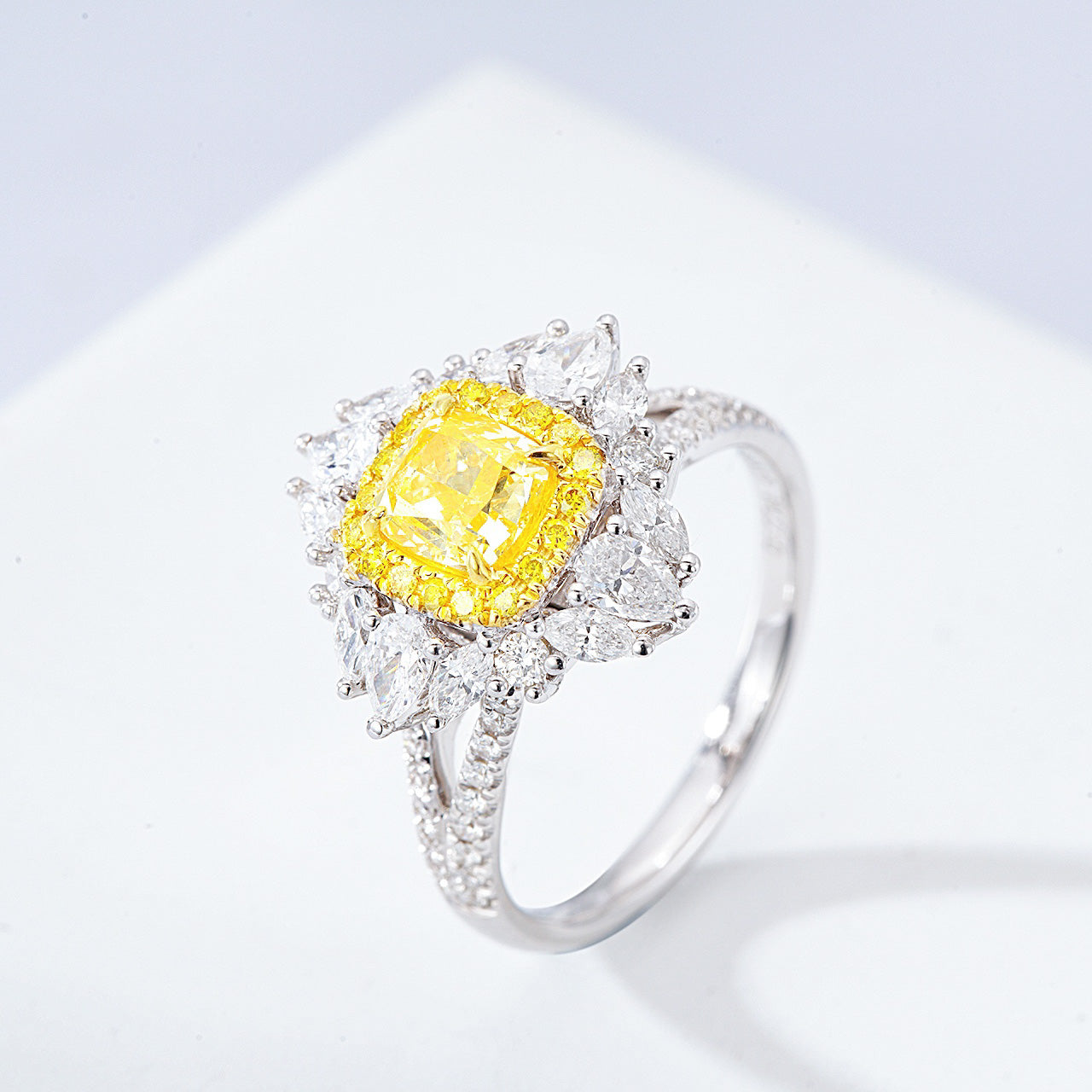 Cushion Cut Yellow Diamond Engagement Ring with Pavé Halo Setting in 18K White Gold -Side Angle