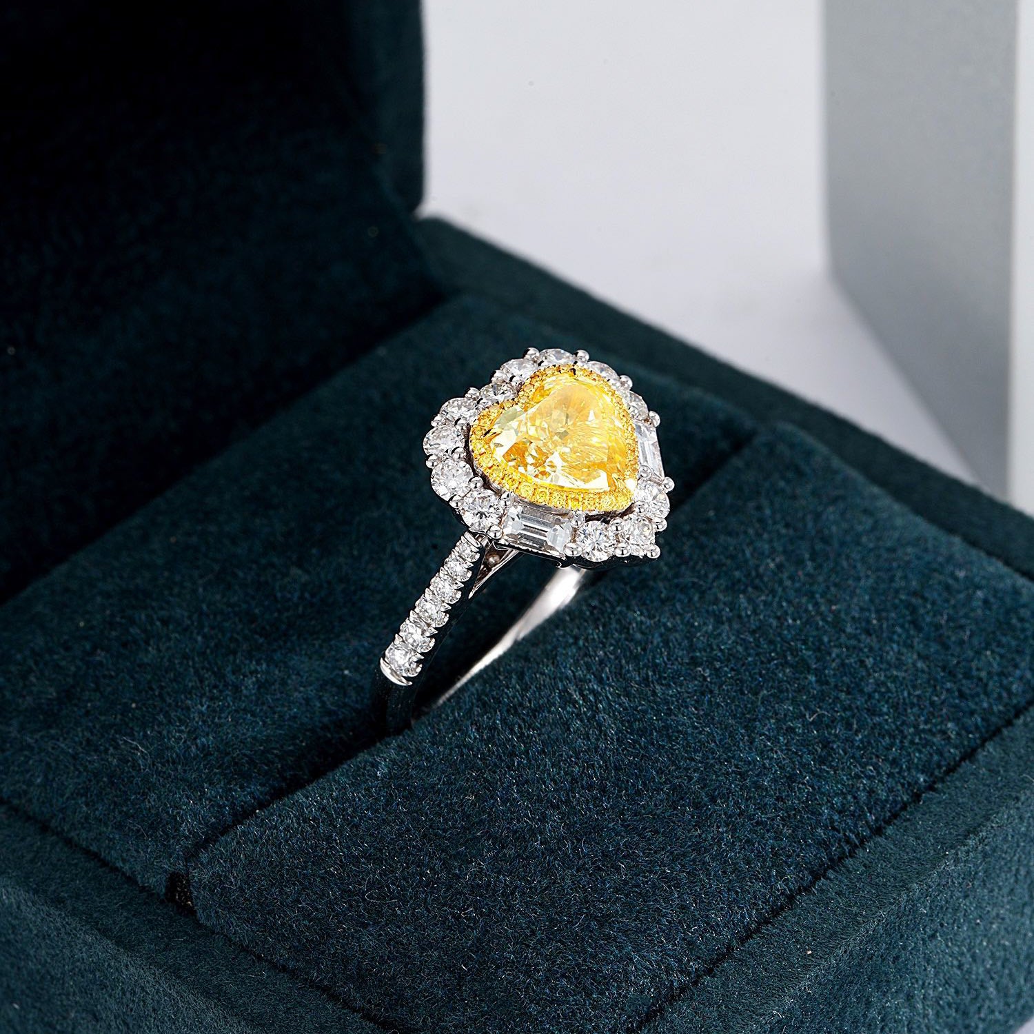 Heart Shaped Yellow Diamond Engagement Ring with Pavé Halo Setting in 18K White Gold -Perspective Close-up