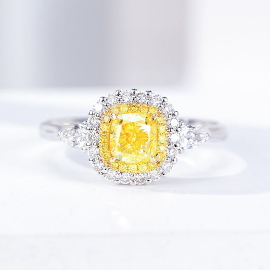 Cushion Cut Yellow Diamond Engagement Ring with Three Stone Halo Setting