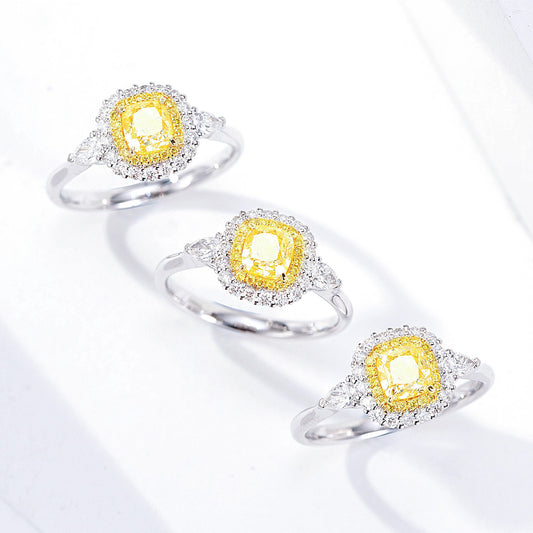 Cushion Cut Yellow Diamond Engagement Ring with Three Stone Halo Setting