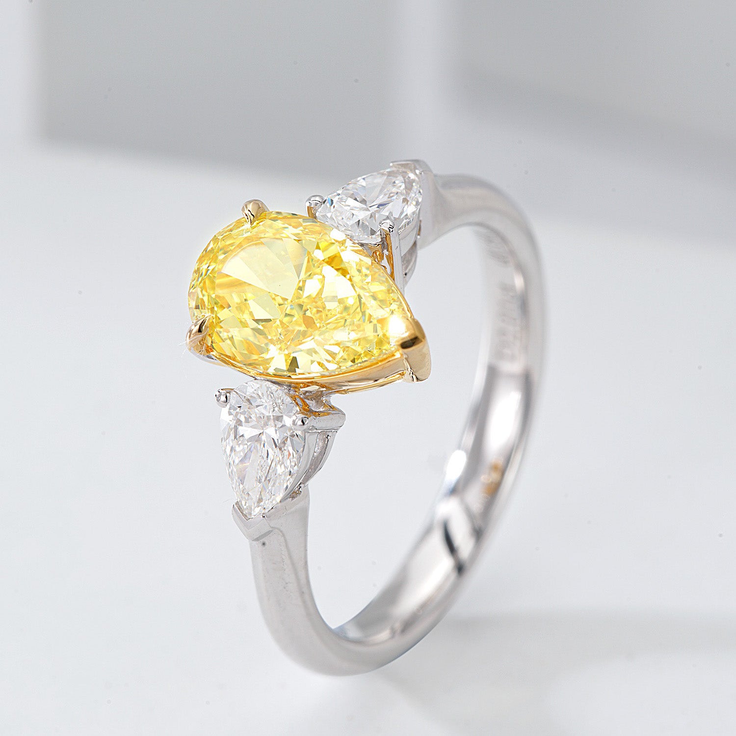 Three Stone Pear Shaped Yellow Diamond Engagement Ring in 18K White Gold -Side Angle