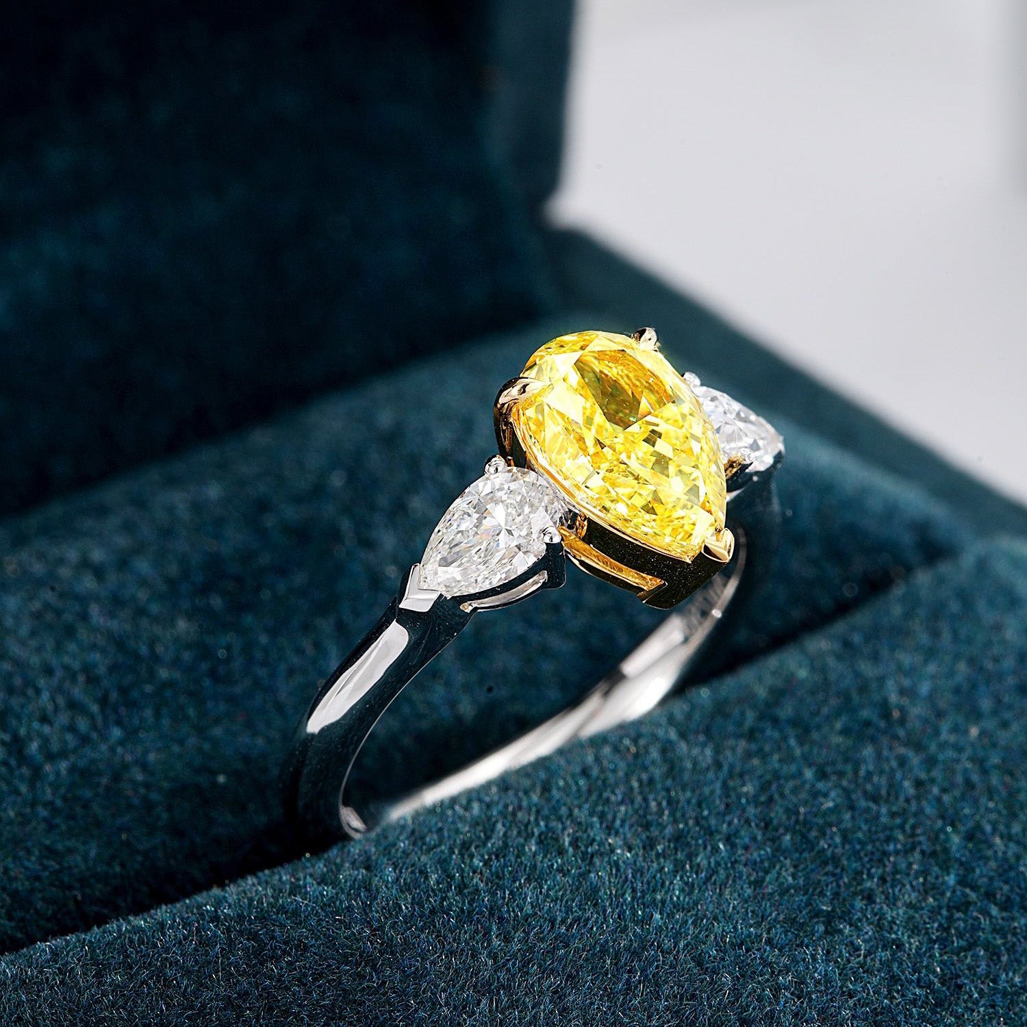 Three Stone Pear Shaped Yellow Diamond Engagement Ring in 18K White Gold -Perspective Close-up